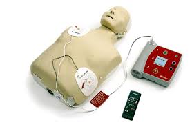 Image of Manikin with AED attached and defibrillation